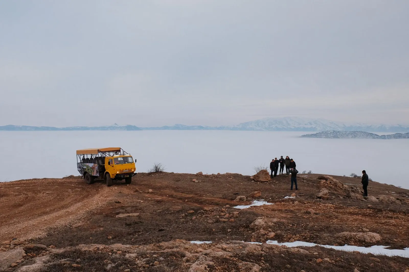 Yell truck on the ridge above a sea of clouds